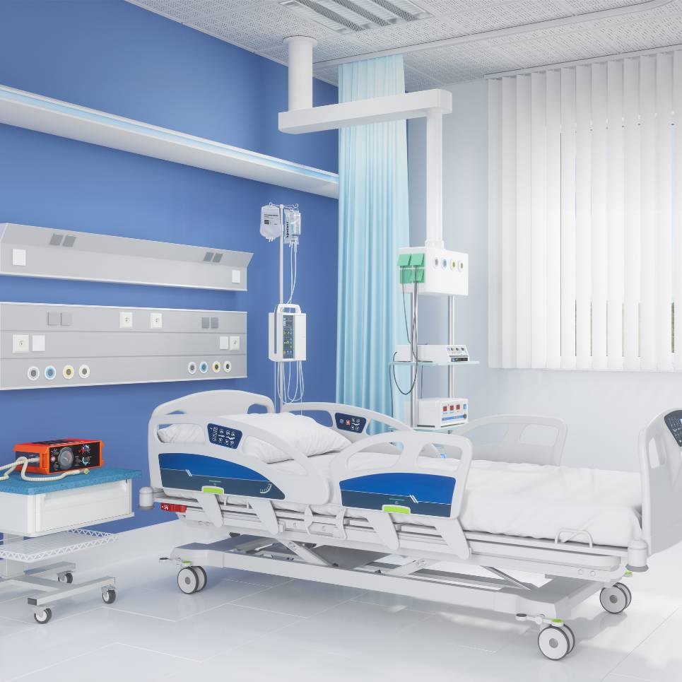 A modern hospital room with a single adjustable bed, white and blue walls, medical equipment, and infusion pumps. A window with vertical blinds enhances the well-lit space. The neatly arranged setting reflects the impeccable standards achieved through professional medical facility cleaning services.